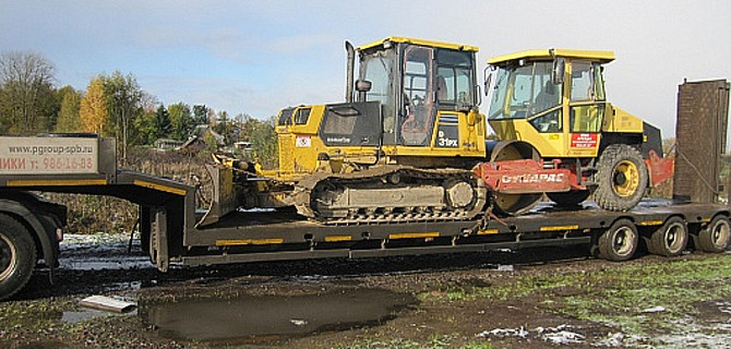 Услуги по перевозке бульдозеров